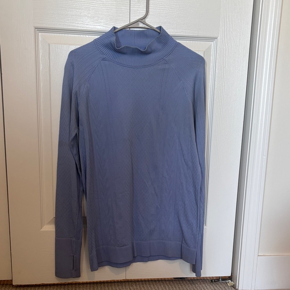 Lululemon Rest Less Mock Neck in the Hydrangea Blue colorway.